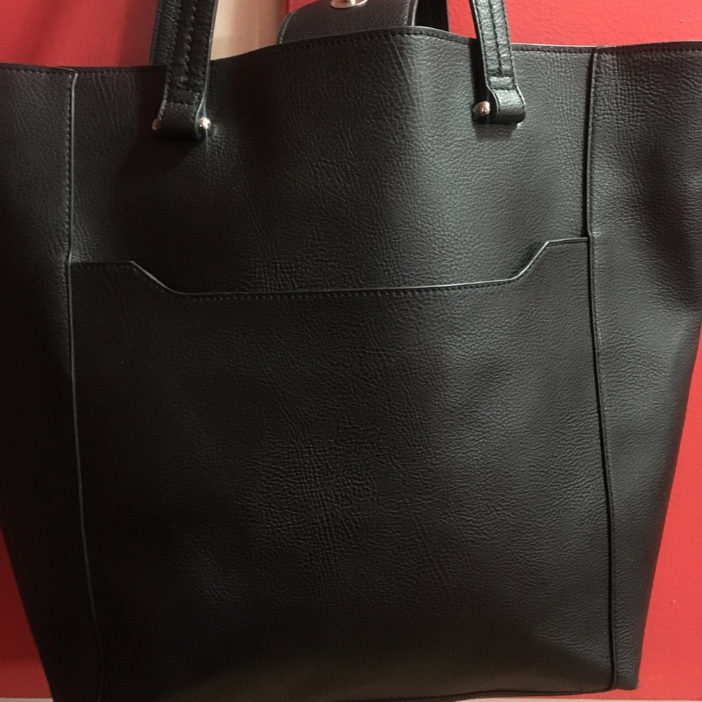 Black Reaction Kenneth Cole purse.